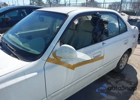 2005 Hyundai Accent Gls из США, поврежденный, VIN KMHCG45C65U652748